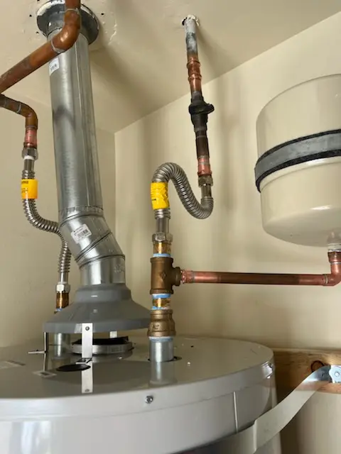 Water heater installation and plumbing repair in Elon